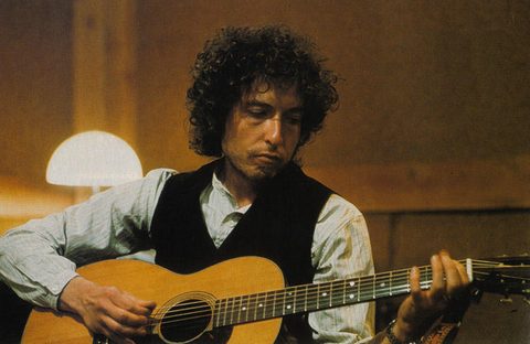 Dylan with guitar, 1974